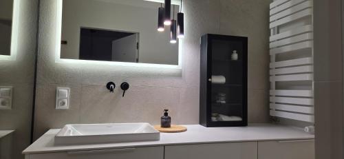 Koupelna v ubytování Apartament Giżycko Studio 51 z widokiem na park