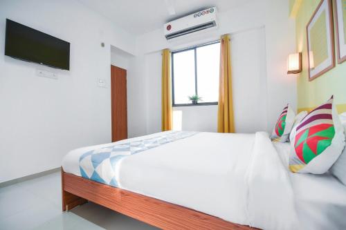 Ένα ή περισσότερα κρεβάτια σε δωμάτιο στο Hotel O Aakiyo Pashan Hill