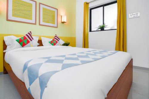 Ένα ή περισσότερα κρεβάτια σε δωμάτιο στο Hotel O Aakiyo Pashan Hill