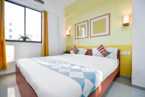 Ένα ή περισσότερα κρεβάτια σε δωμάτιο στο Hotel O Aakiyo Pashan Hill