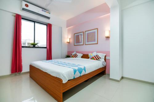 Ένα ή περισσότερα κρεβάτια σε δωμάτιο στο Hotel O Aakiyo Pashan Hill
