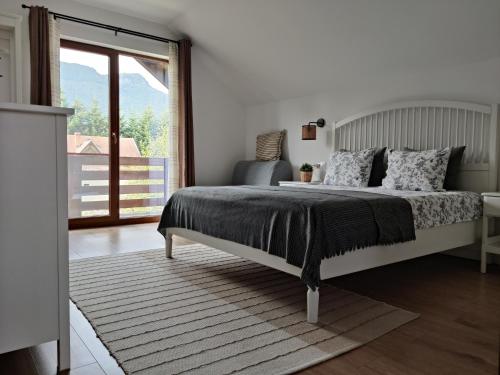 Llit o llits en una habitació de Ara Chalet