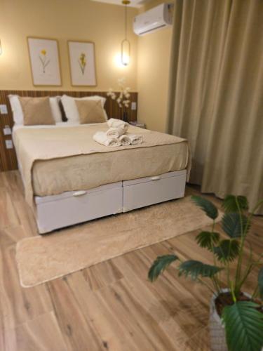 Postel nebo postele na pokoji v ubytování Green Flats em Miguel Pereira