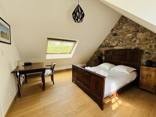 Voodi või voodid majutusasutuse ty Gouermel Location Bretagne toas