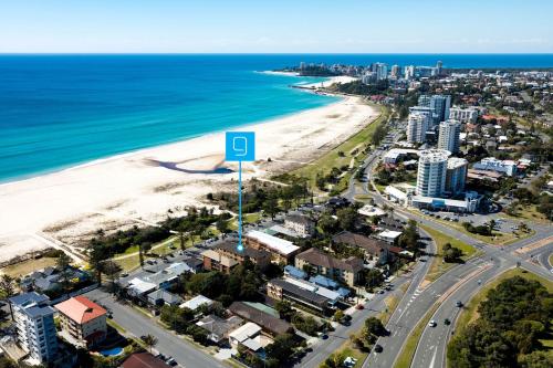 an aerial view of the beach and the ocean at Lou's Tiki Pad in Gold Coast