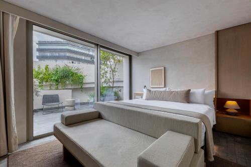 En eller flere senge i et værelse på Lamartine Boutique Hotel Polanco