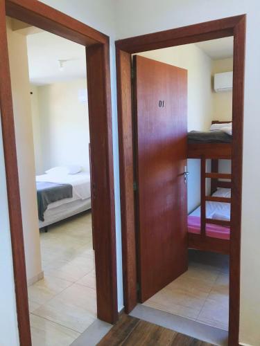 Ein Bett oder Betten in einem Zimmer der Unterkunft Pousada Nova Trilha