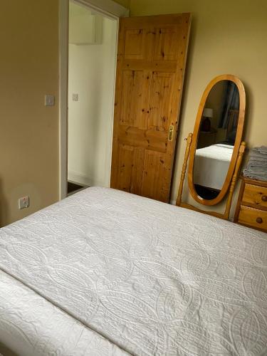Una cama o camas en una habitación de Gooig Getaway