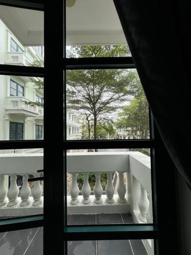 a view of a balcony from a window at 118 Orchid in Phú Quốc