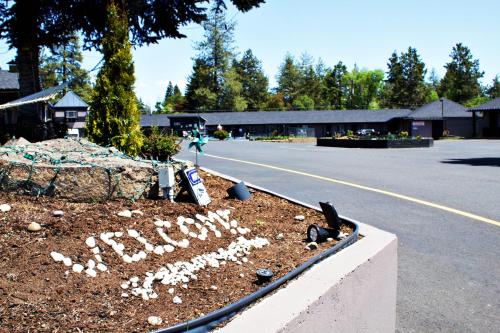 a sign that says bully written on the side of a road at Cascade Lodge - Central Bend Retreat in Bend