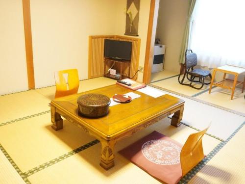 盛岡つなぎ温泉　旅染屋 山いち にあるテレビまたはエンターテインメントセンター