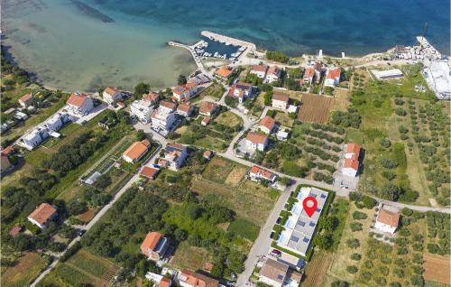 an aerial view of a city with houses and the water at Villa K1 in Zadar