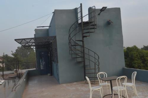 Balkón nebo terasa v ubytování Torobali IMMO Apartment 6- Stylish 1BR- Central Bamako- Comfort & Convenience