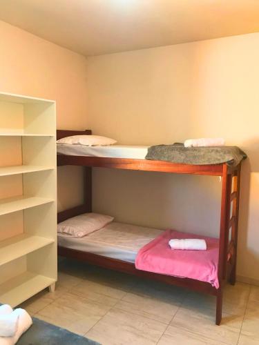 Ein Bett oder Betten in einem Zimmer der Unterkunft Pousada Nova Trilha
