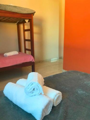 Ein Bett oder Betten in einem Zimmer der Unterkunft Pousada Nova Trilha