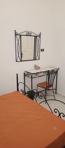 Ein Bett oder Betten in einem Zimmer der Unterkunft Chambre grand Lit