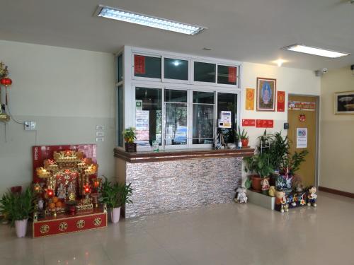 a store with a christmas display in a building at ฐิติกร แกรนด์วิว in Thanya Buri