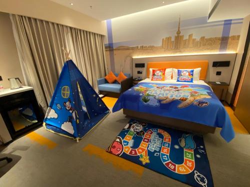 Katil atau katil-katil dalam bilik di Hampton by Hilton Foshan Dali