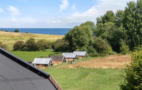 an aerial view of a group of barns in a field at Cozy Home In Sejerø With Wifi in Sejerby
