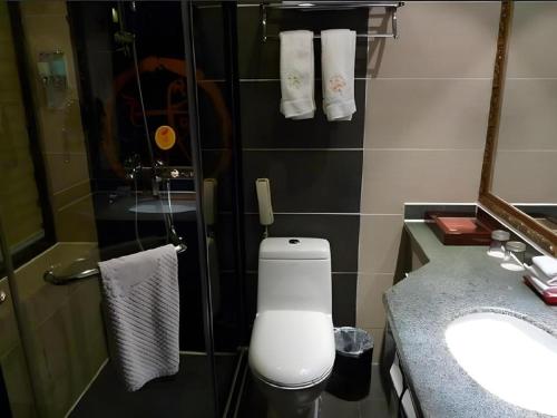 Koupelna v ubytování Dengfeng Chanwu Hotel