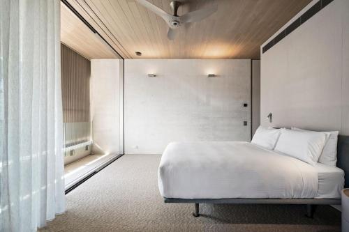 Ένα ή περισσότερα κρεβάτια σε δωμάτιο στο Hastings Villas