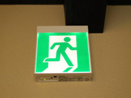 a green and white sign on a wall at 京一軒町家 さと居 鉄仙 SATOI TESSEN Omiya-Gojo in Kyoto