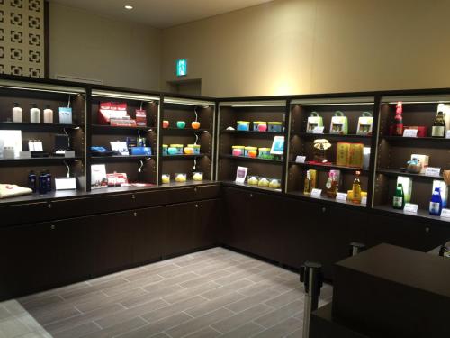 a room with a pharmacyacistacistacistventoryventory at Community & Spa Naha Central Hotel in Naha
