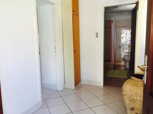 a room with a bathroom with a toilet and a sink at Apartments Tatjana in Martinšćica