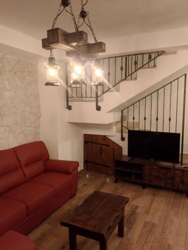 Ruang duduk di Locanda Sarel, intera casa vacanza 4 camere 5 bagni 14 posti letto