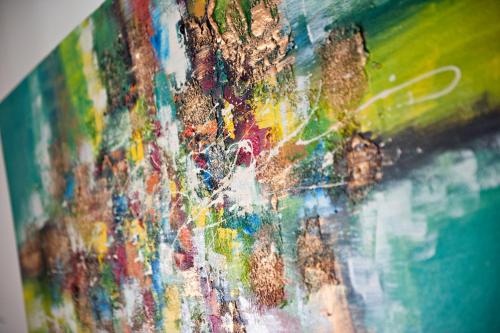 a close up of a painting on a wall at Lime Hotel Boracay in Boracay