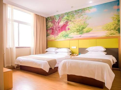 Katil atau katil-katil dalam bilik di GreenTree Inn Zhejiang Ningbo Exhibition and Convention Center Bus East Station Express Hotel