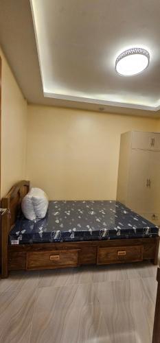 Postel nebo postele na pokoji v ubytování IBM Homestay