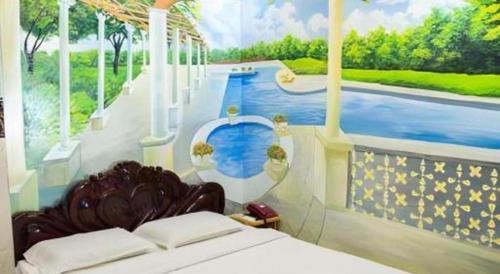 a bedroom with a painting of a swimming pool at Phuong Linh Hotel in Ho Chi Minh City