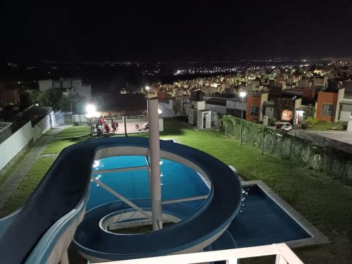 Der Swimmingpool an oder in der Nähe von Casa de descanso