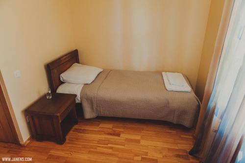 Postel nebo postele na pokoji v ubytování Rudzupuķes