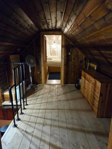an inside view of a room with a bed at Chalupa Liptovský dych in Svätý Kríž
