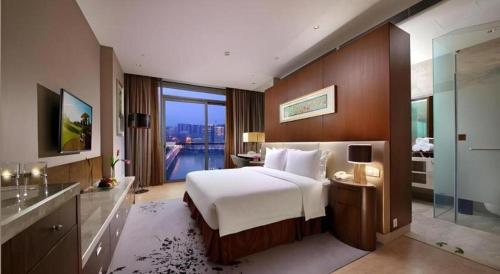 Katil atau katil-katil dalam bilik di Fliport Hotel Zhangzhou Yuanshan