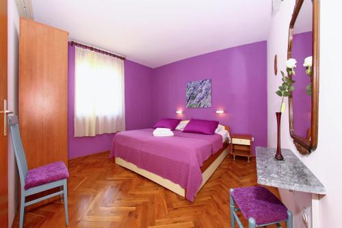Ένα ή περισσότερα κρεβάτια σε δωμάτιο στο Rooms & Apartments Soline Nuove