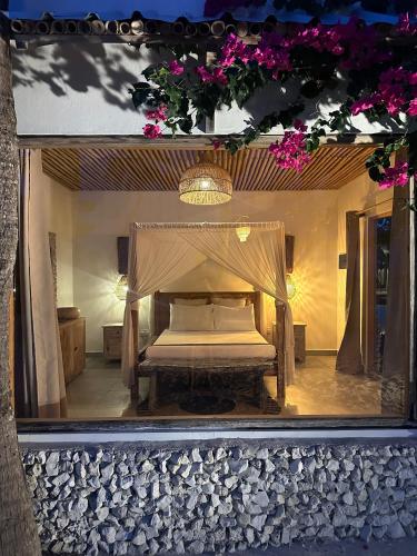 Una cama o camas en una habitación de Met House