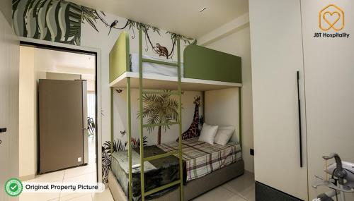 Postel nebo postele na pokoji v ubytování For NRI by NRI Penthouse A3-1004