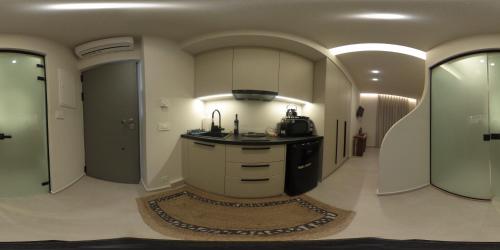 Kuchyň nebo kuchyňský kout v ubytování Casadei luxury sea view apartment