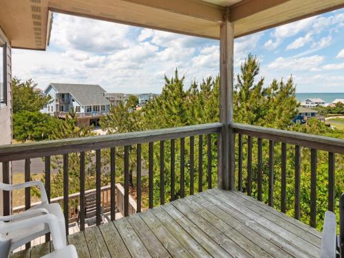 a balcony with a view of the ocean at 2030 - Horizon`s Summit in Duck