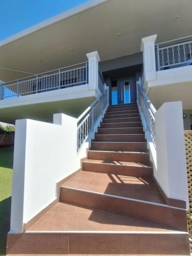 a staircase leading up to a house at Solena in Tsikalariá