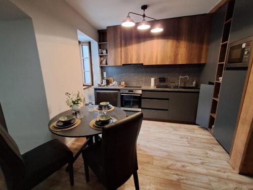 Una cocina o zona de cocina en Apartmán Akademik