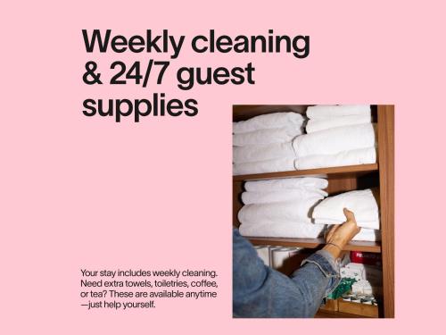 a flyer forweekly cleaning and guest supplies with a person holding a shelf at Numa Brussels Royal Galleries in Brussels