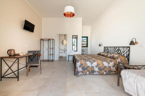 Katil atau katil-katil dalam bilik di Masseria San Biagio