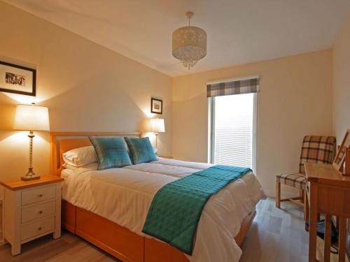 Ένα ή περισσότερα κρεβάτια σε δωμάτιο στο Fairway Apartment