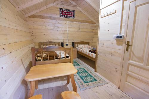 Postel nebo postele na pokoji v ubytování Bungalows Katun Maja Karanfil