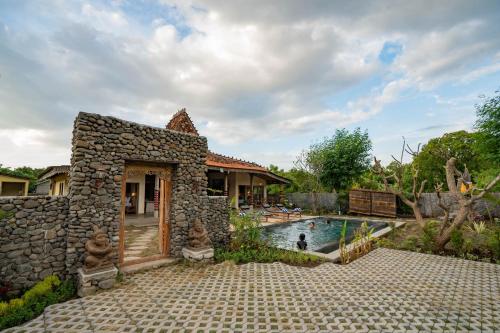 Πισίνα στο ή κοντά στο Hita Joglo Villa
