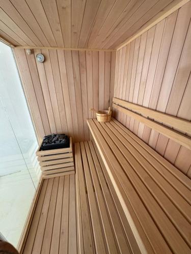 a inside of a sauna with a bench in it at Attico sul Mare - Suite & Spa in Palermo